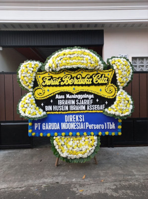 Papan Bunga Duka di Dasan Agung
